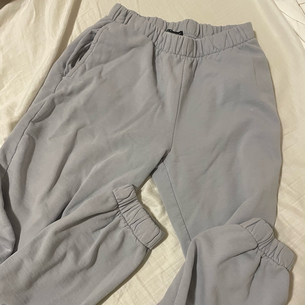 brandy melville john galt light blue rosa sweatpants